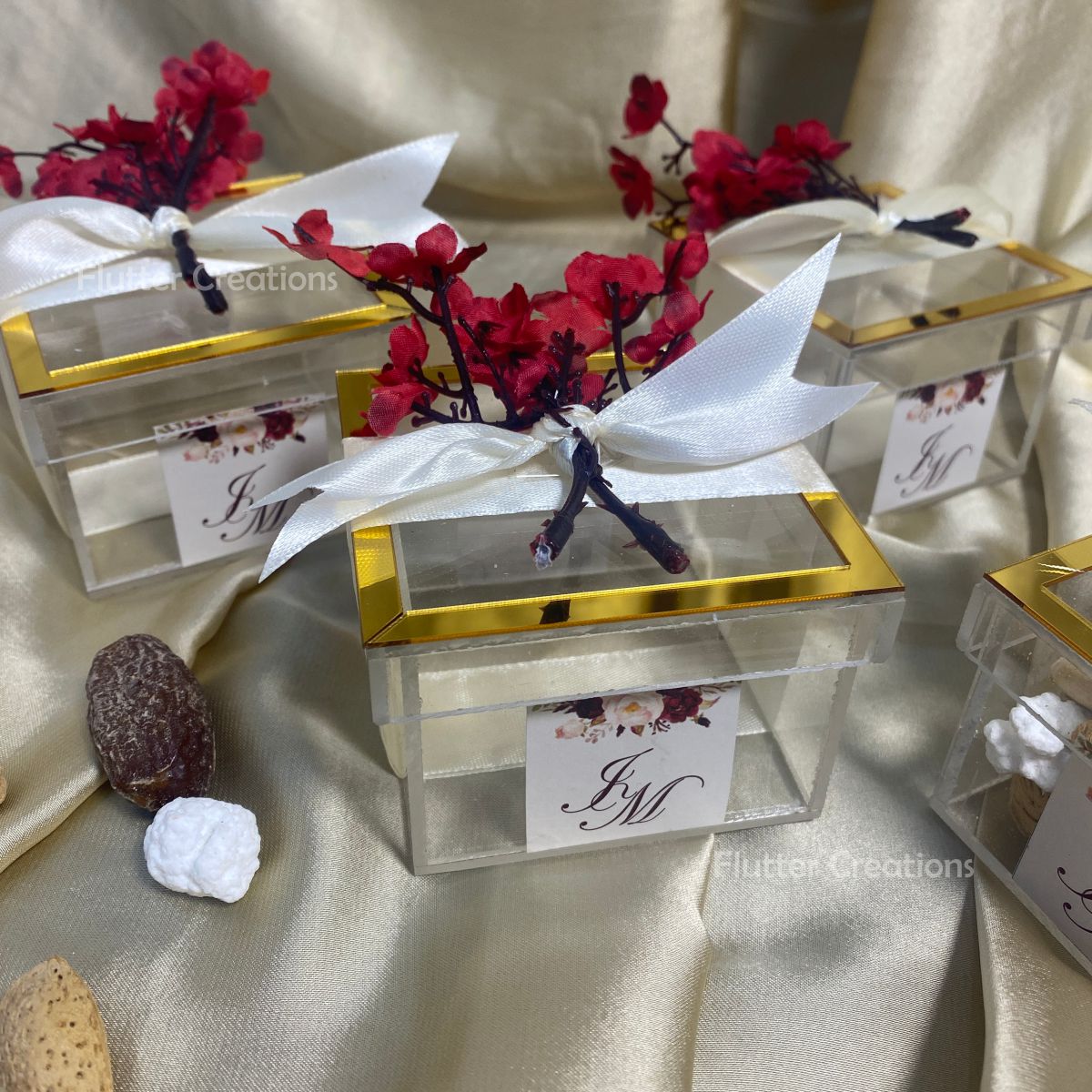 Bid Acrylic Box with Golden Borders & a Ribbon