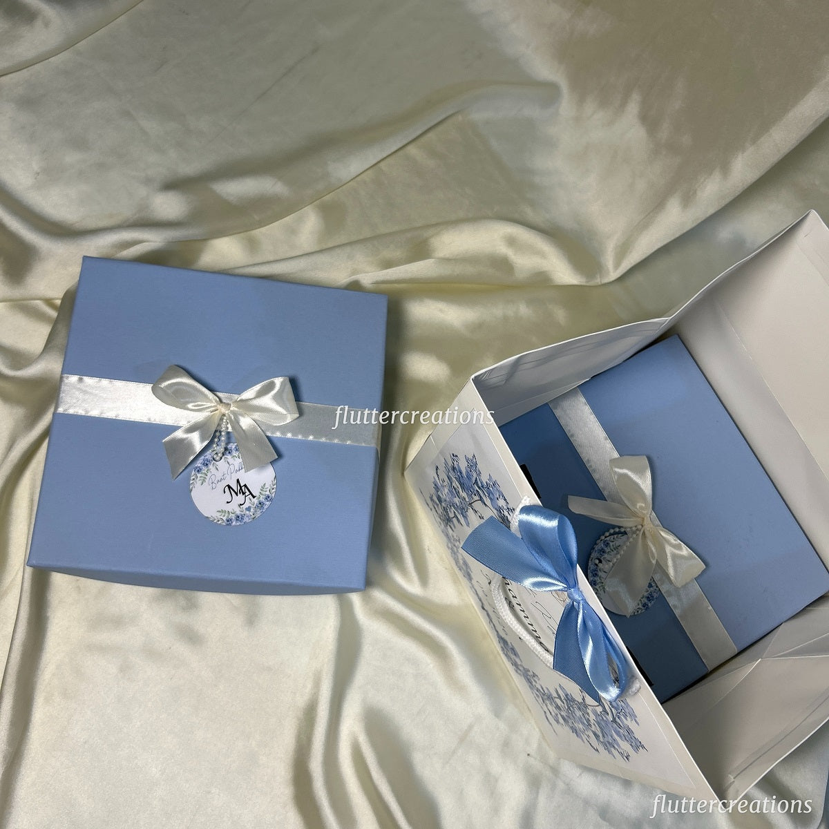 Blue Box with Off white Ribbon and Tag