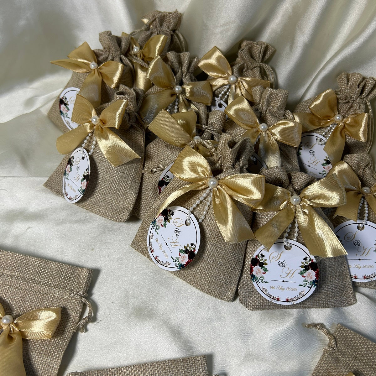Khaki Jute Pouches with Golden Ribbon