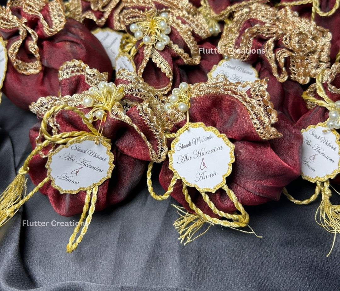 Maroon Organza Potlis with single pearl tassel and name tag
