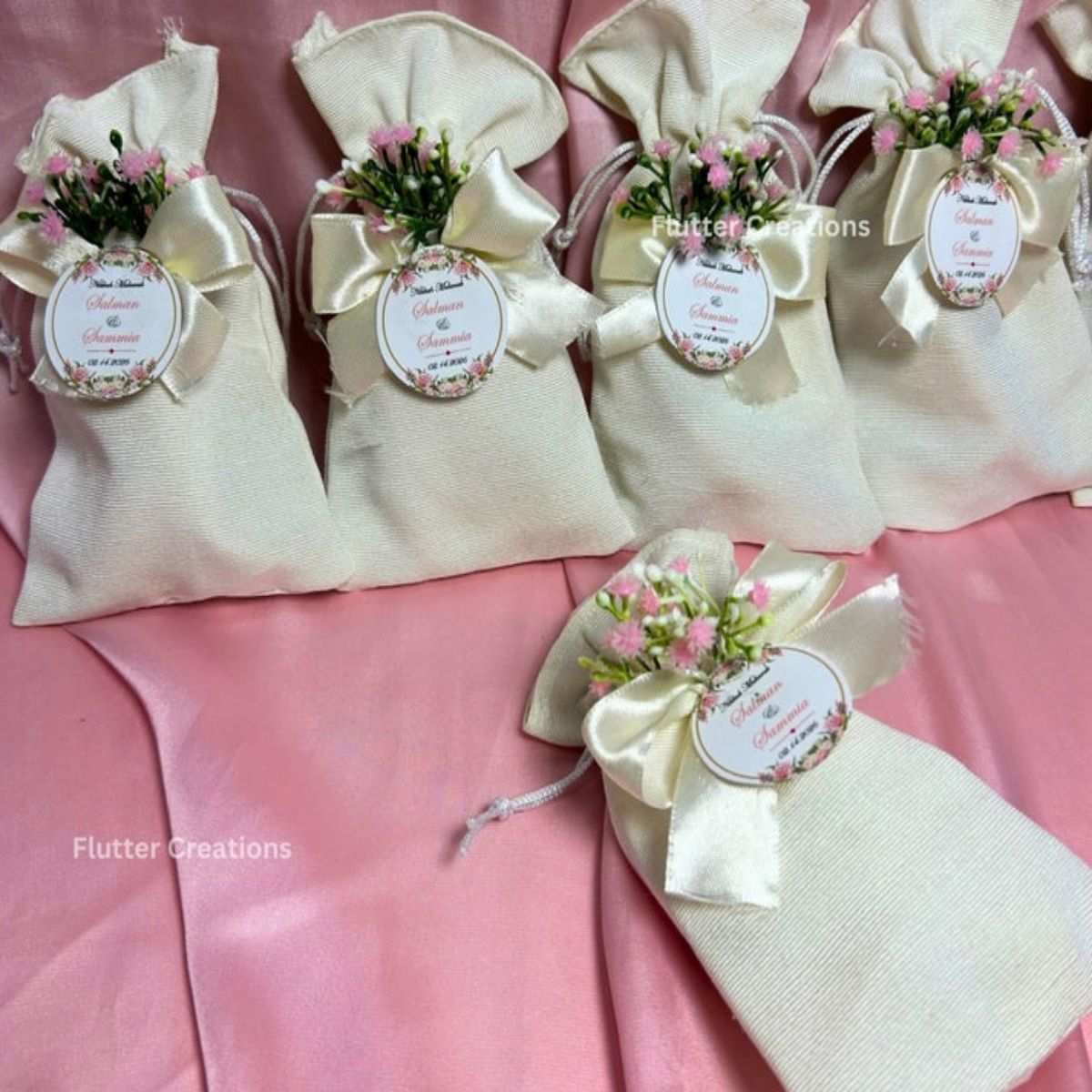 Premium White Pouches with Pink Baby's breath