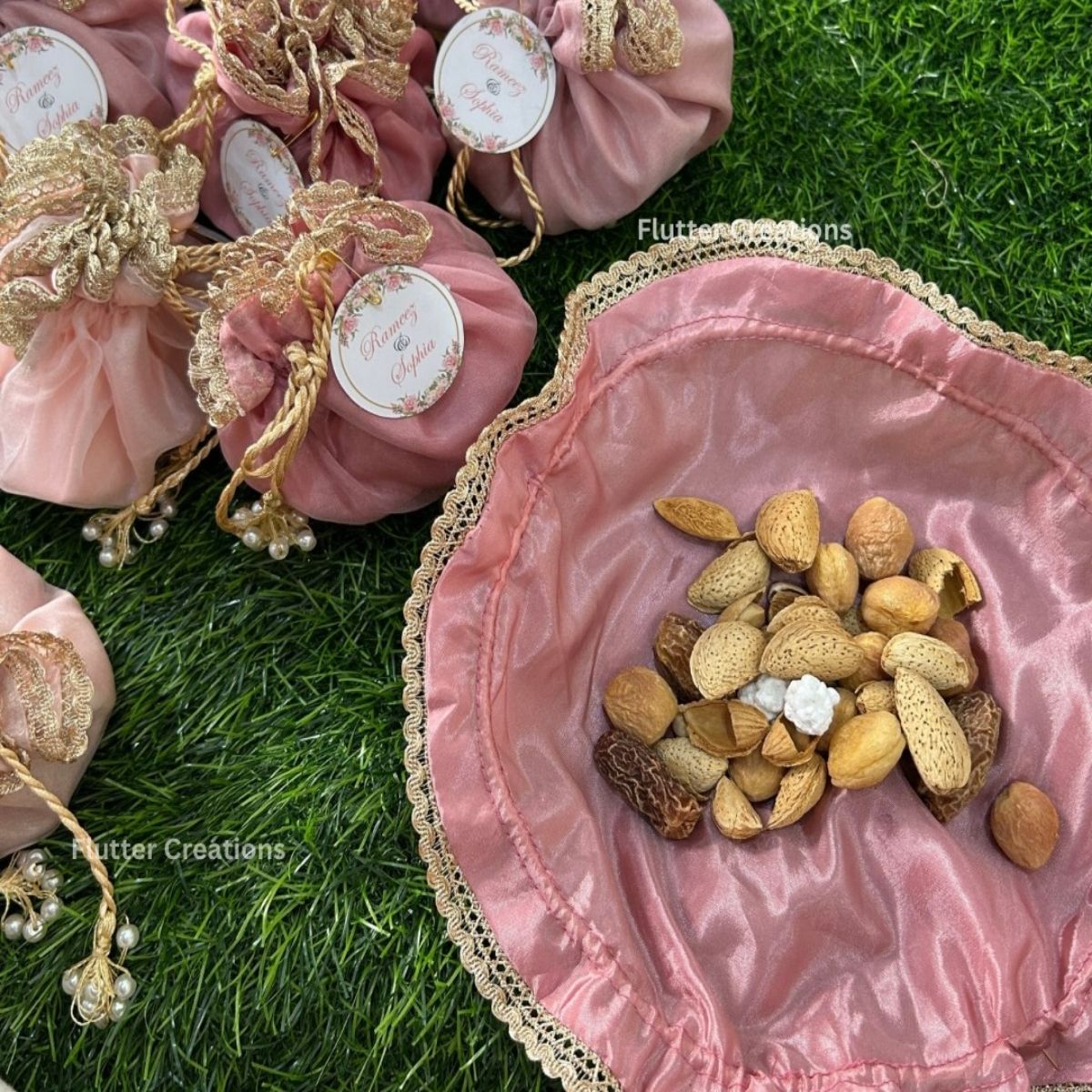 Pastel Pink Organza potlis with Double Pearl tassel and name tag