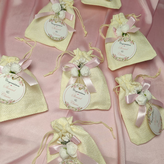 Premium White Pouches/Bags with Ribbon,flower and name tag