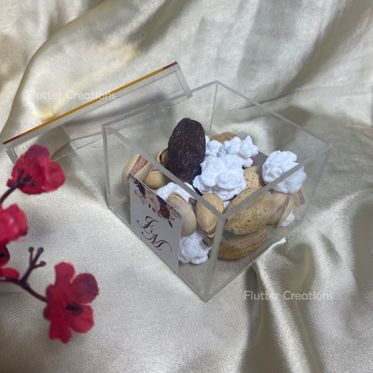 Bid Acrylic Box with Golden Borders & a Ribbon