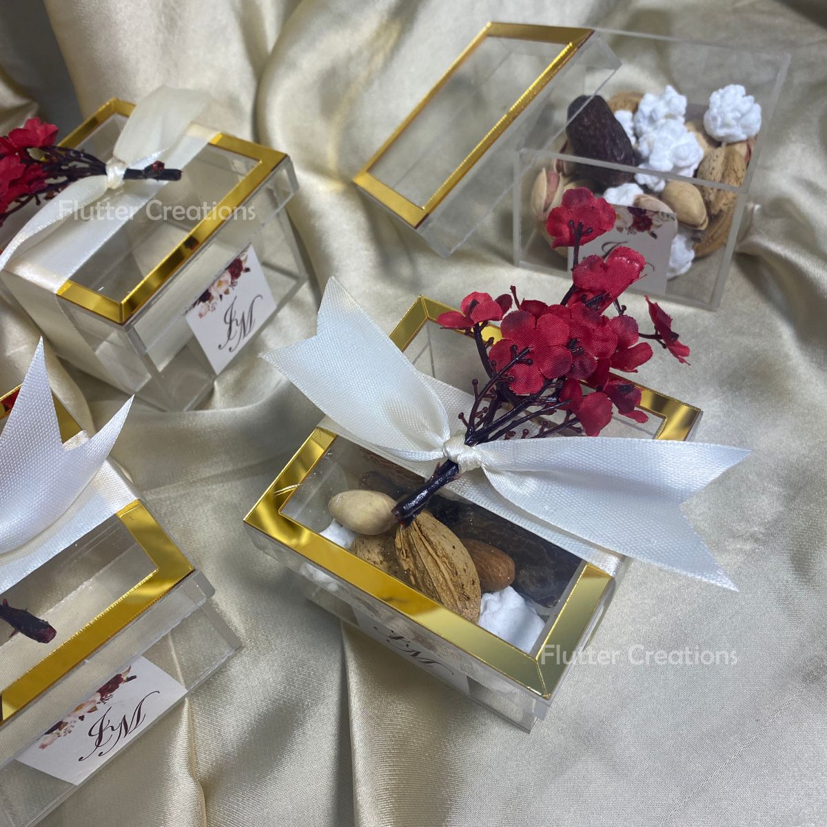 Bid Acrylic Box with Golden Borders & a Ribbon