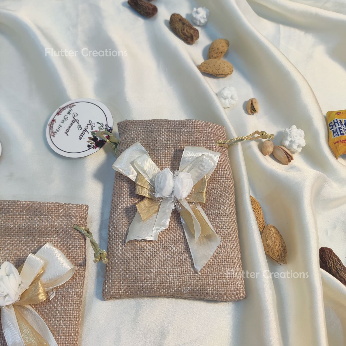 Khaki Jute Pouch with ribbons, flower & a tag