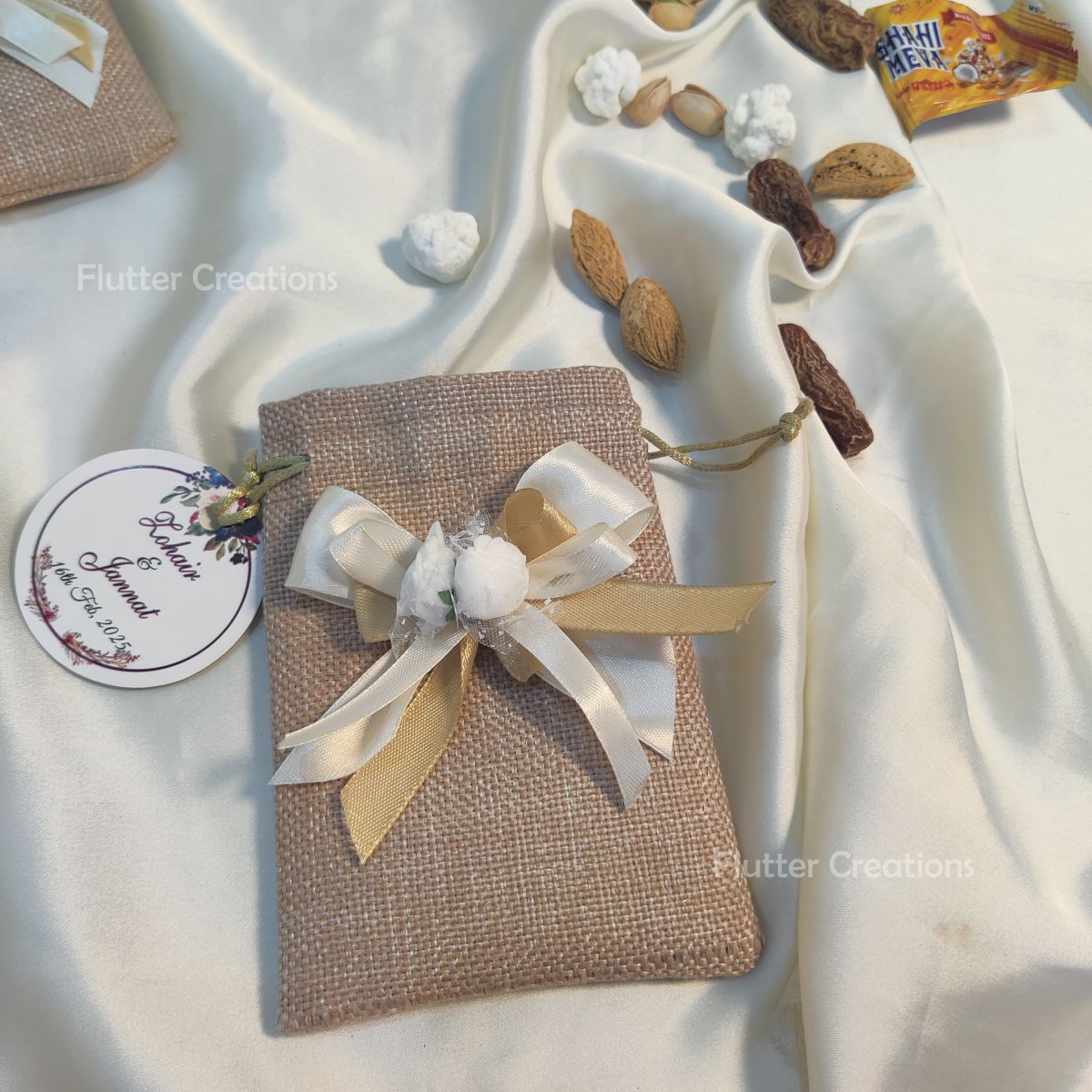 Khaki Jute Pouch with ribbons, flower & a tag