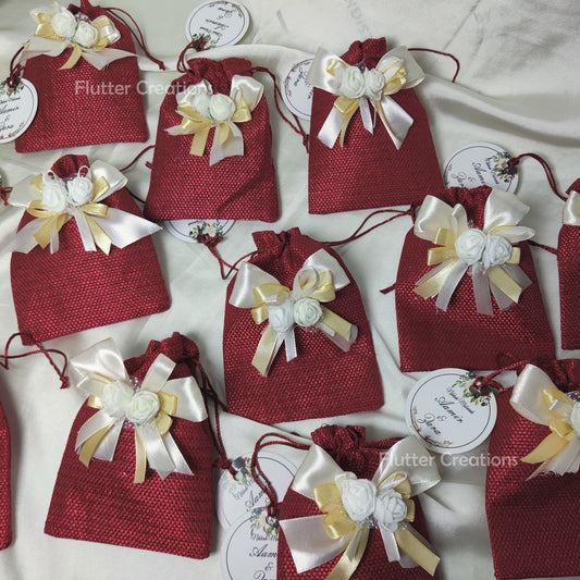 Maroon Jute Pouch with ribbons, flower & a tag
