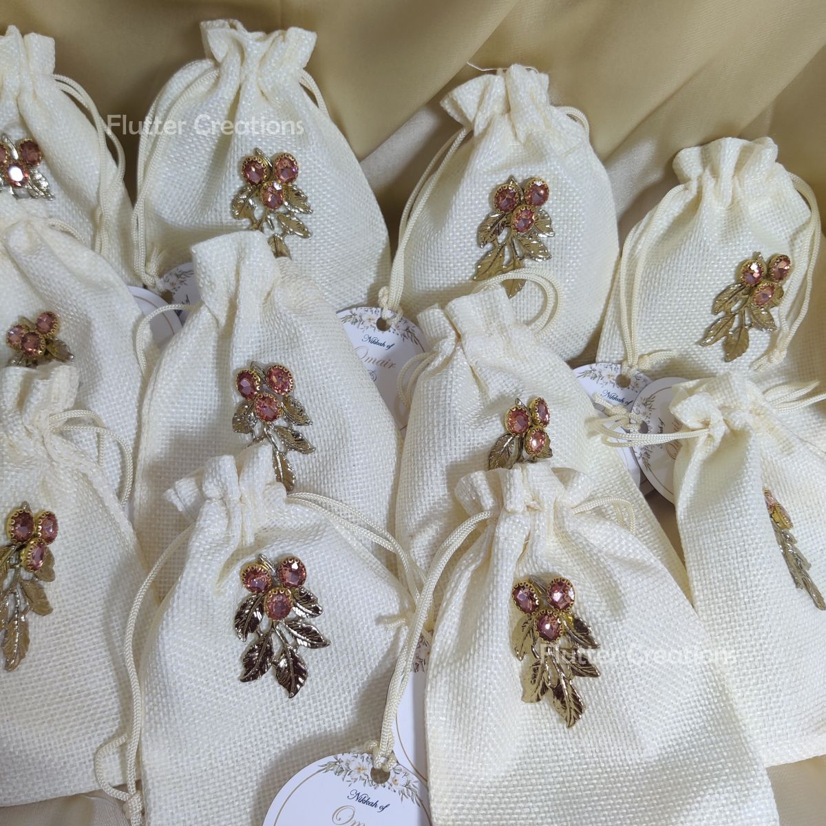 White Jute Pouch with Gold Metal Leaf & Name Tag