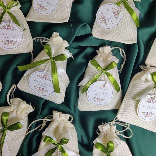 White Jute Pouch with two Ribbons & Tag