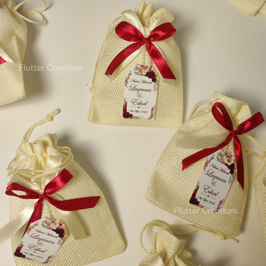 White Jute Pouch with two Ribbons & Tag