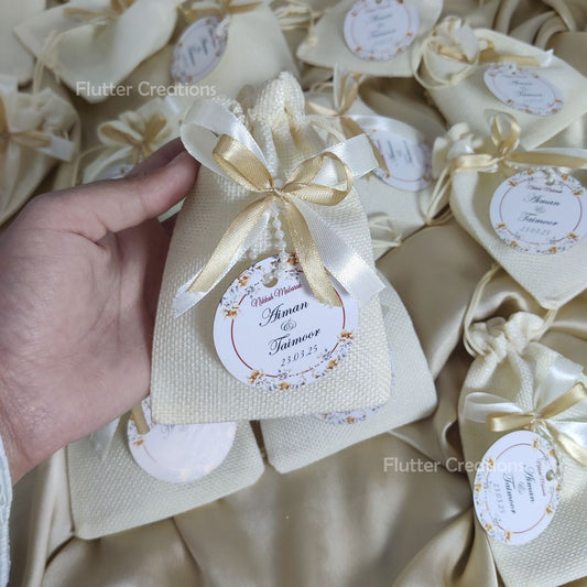 White Jute Pouch with two Ribbons & Tag