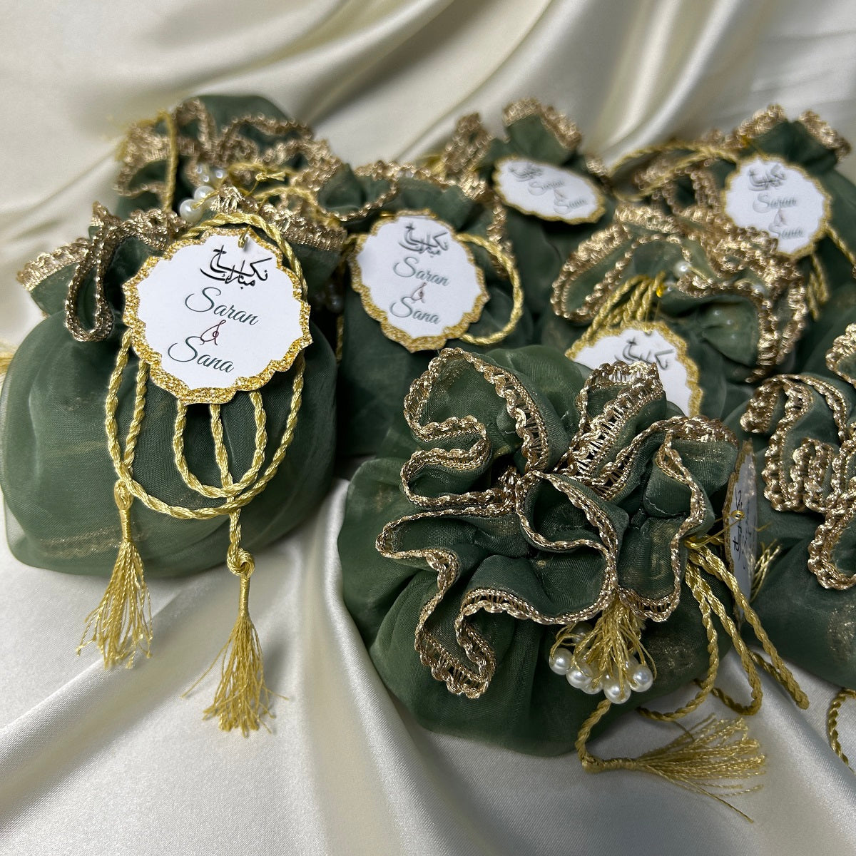 Mint Green Organza potlis with pearl lace and tassel