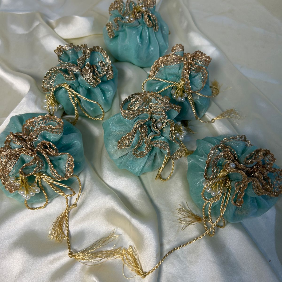 Ice Blue Double Organza potlis with Pearl tassel and name tag