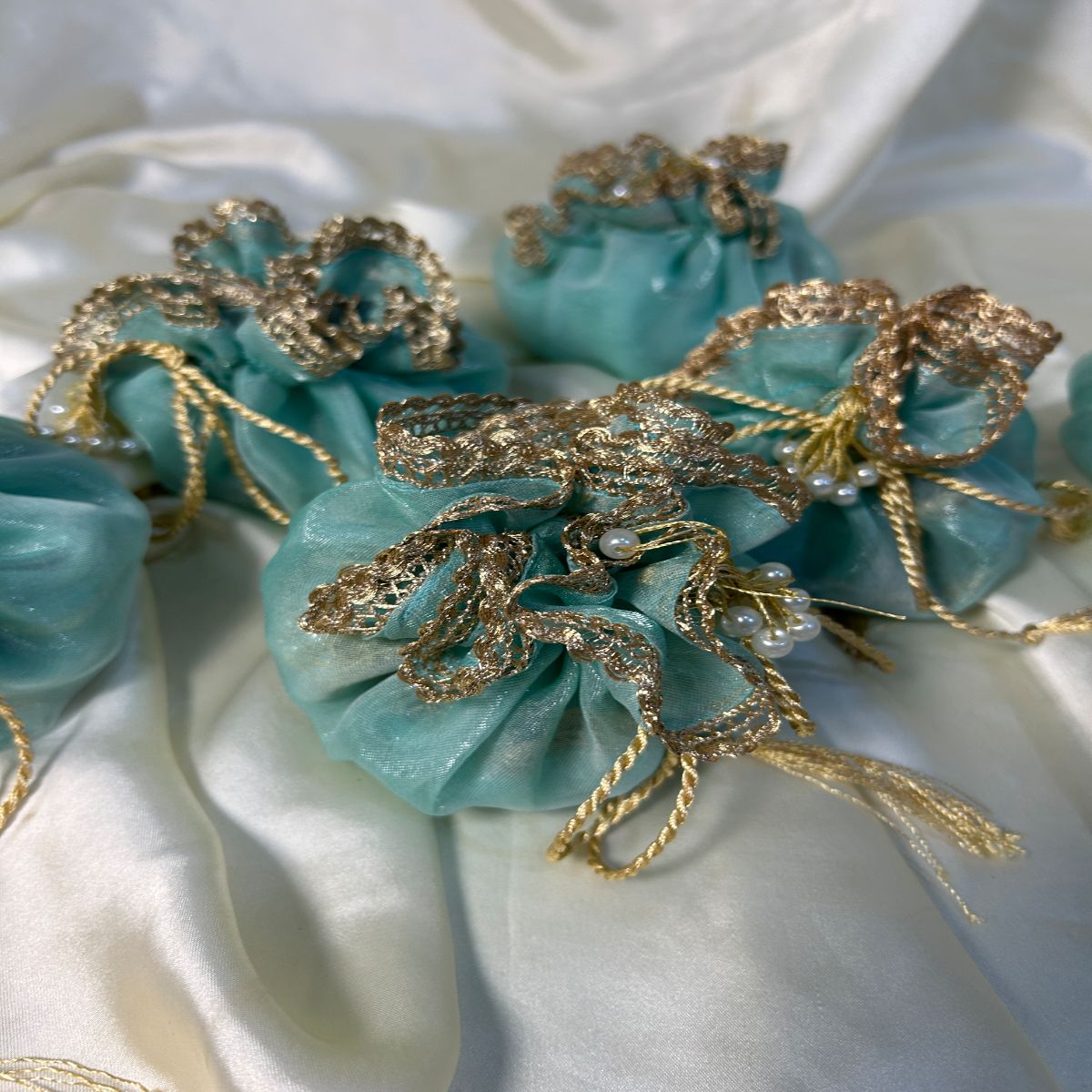 Ice Blue Double Organza potlis with Pearl tassel and name tag