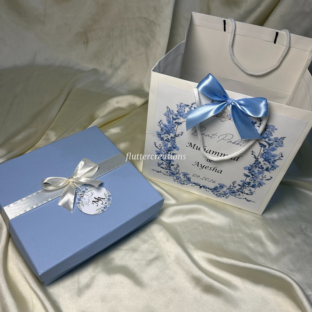 Blue Box with Off white Ribbon and Tag