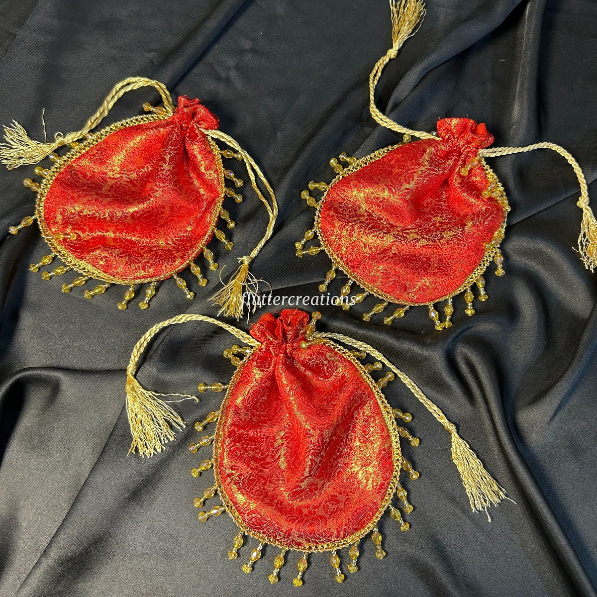 Red or Golden Jamawar Pouches with Jhalar Lace