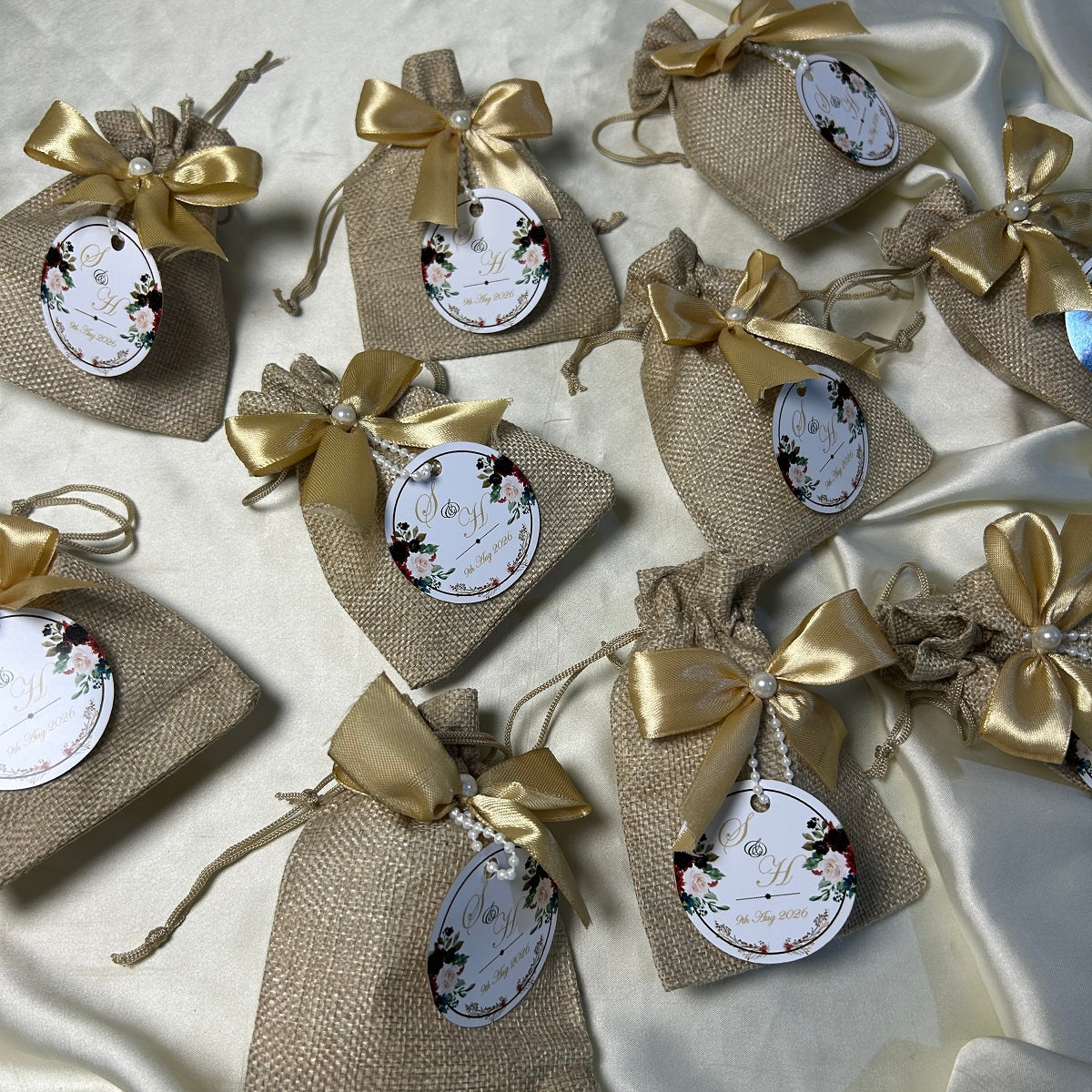 Khaki Jute Pouches with Golden Ribbon