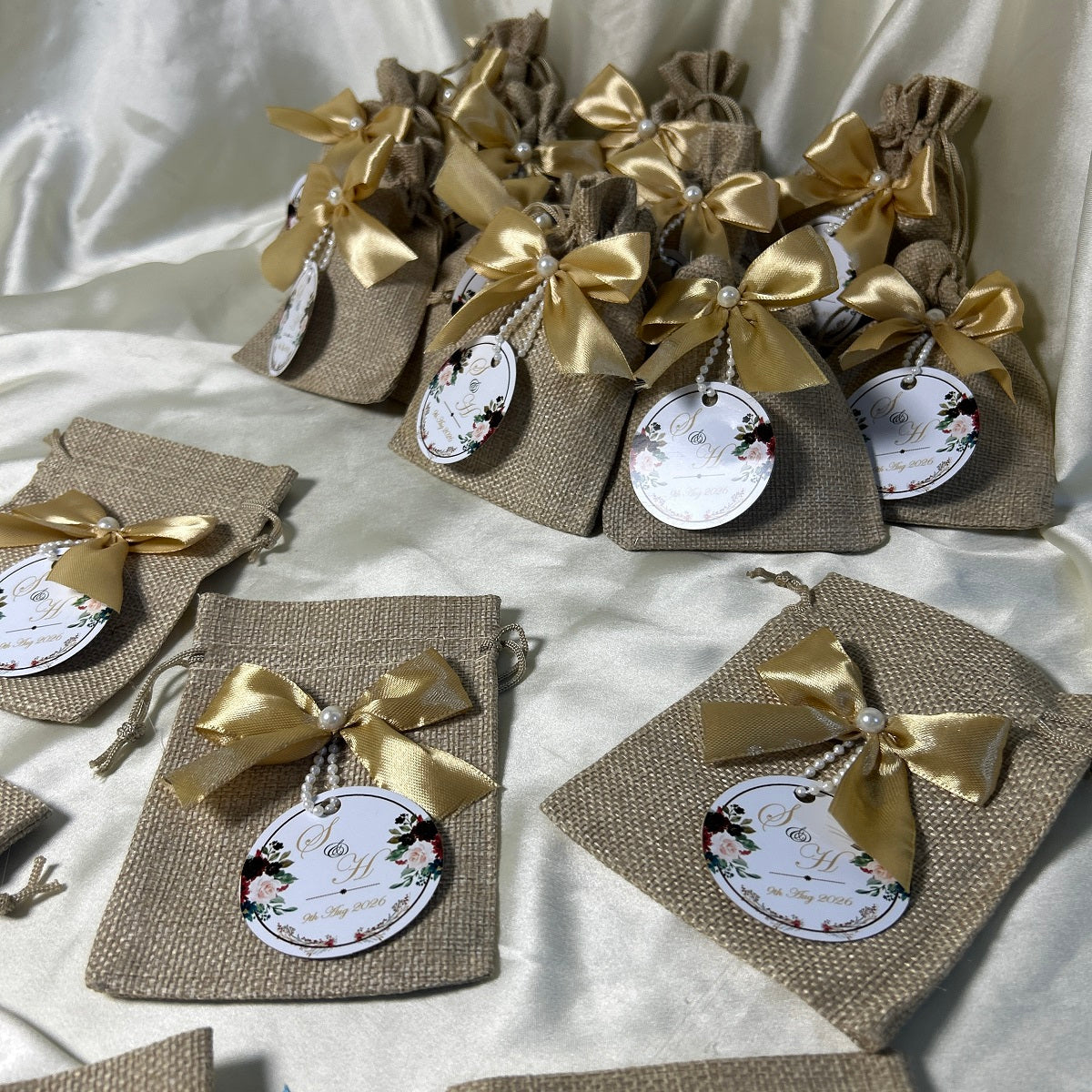 Khaki Jute Pouches with Golden Ribbon