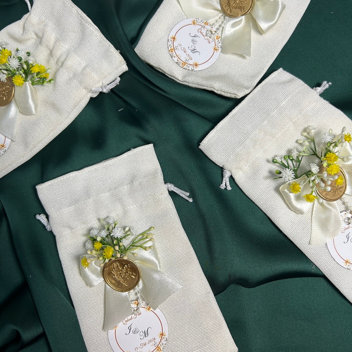 Premium White Pouches with Wax Stamp and Yellow Baby's breath