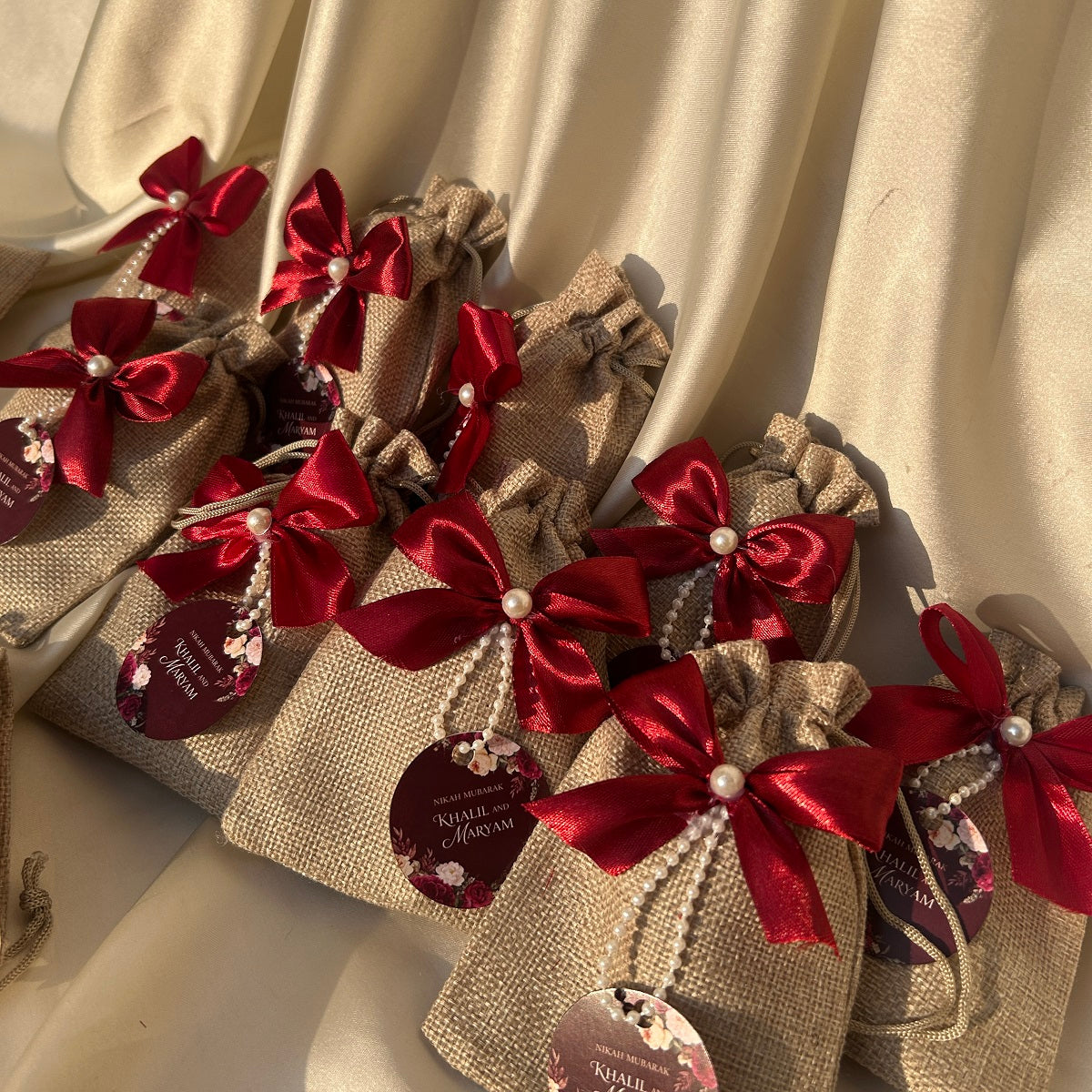 Red Ribbon Jute Pouches