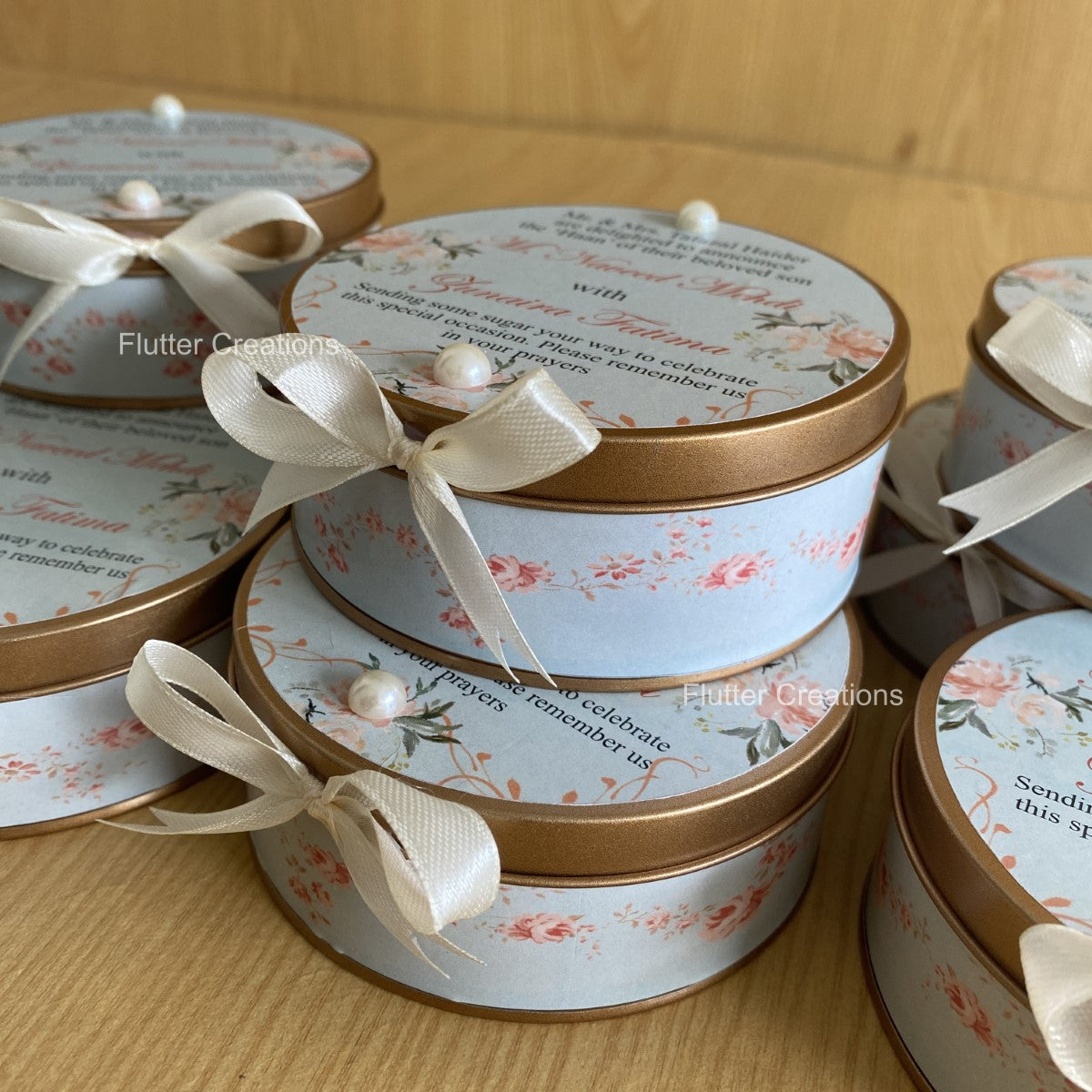 Round Tin Box with customized print, pearl and ribbon