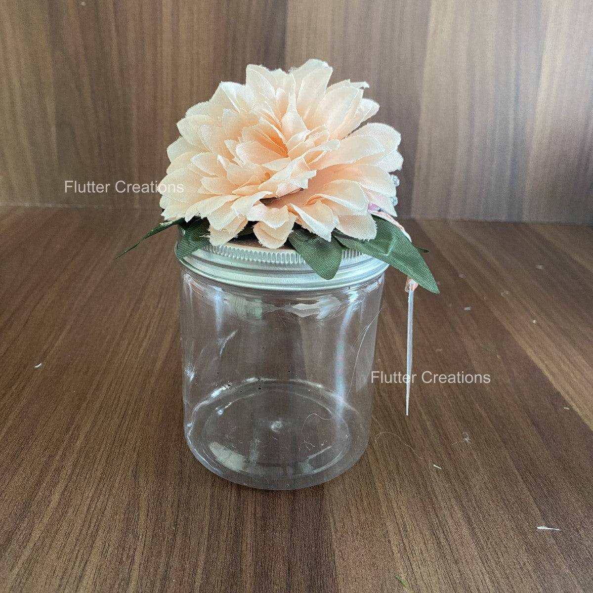 Wedding Jar with floral decor on top	Plastic