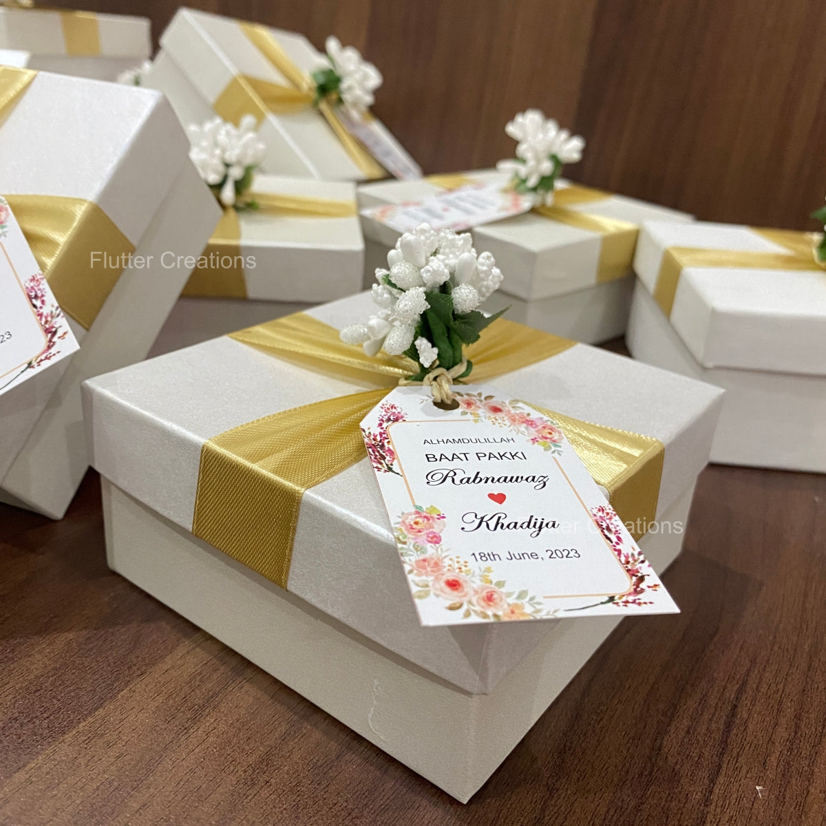 White Box with Golden Ribbon
