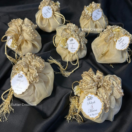 Beige Organza Potlis with single pearl tassel and name tag