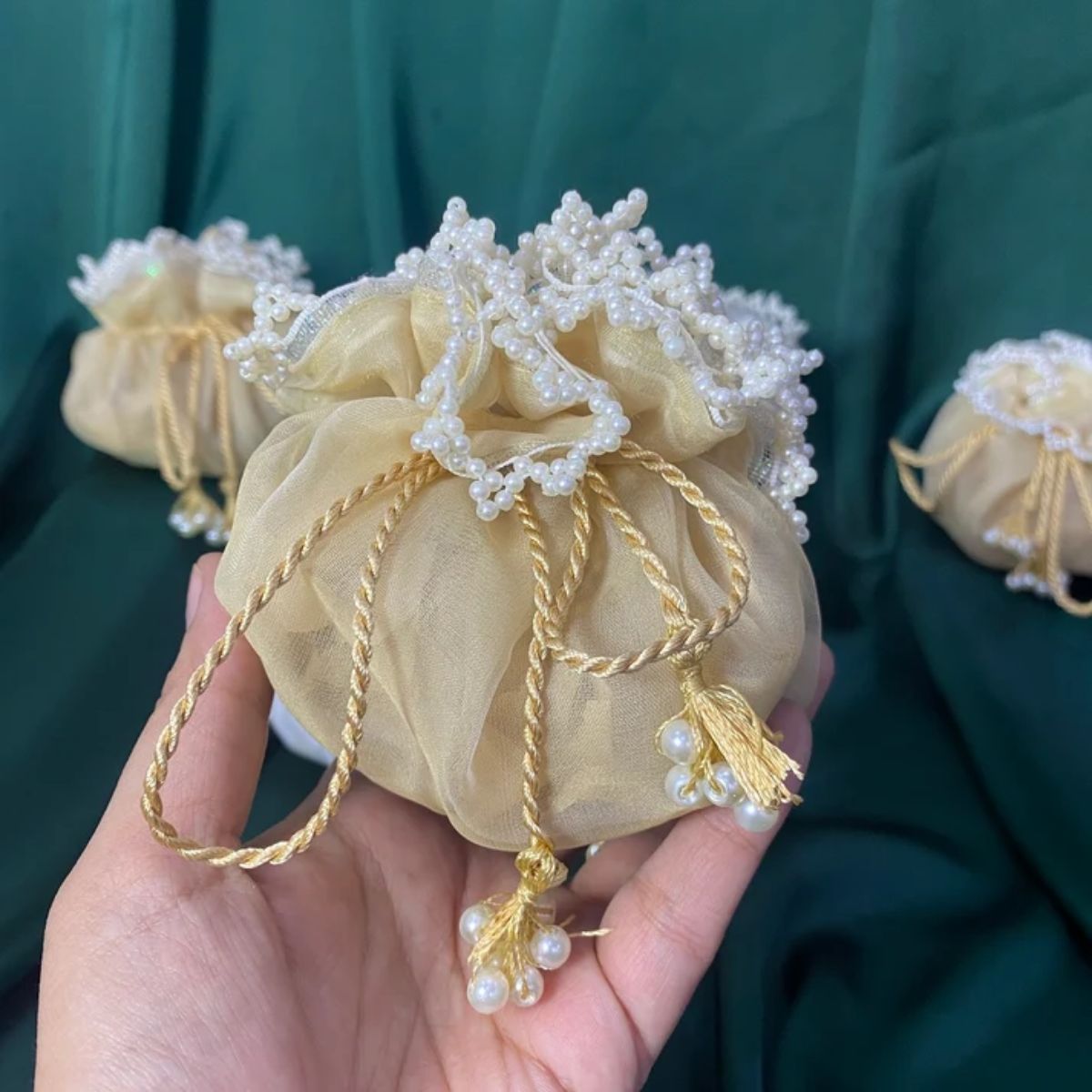 Golden & White Organza potlis/pouches with pearl lace and tassel