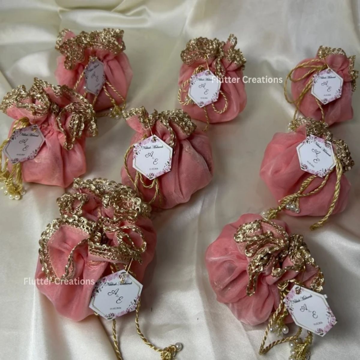 Soft Pink Organza potlis with Pearl tassel and name tag