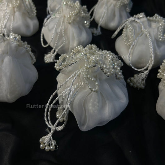 White Organza potlis/pouches with pearl lace and tassel