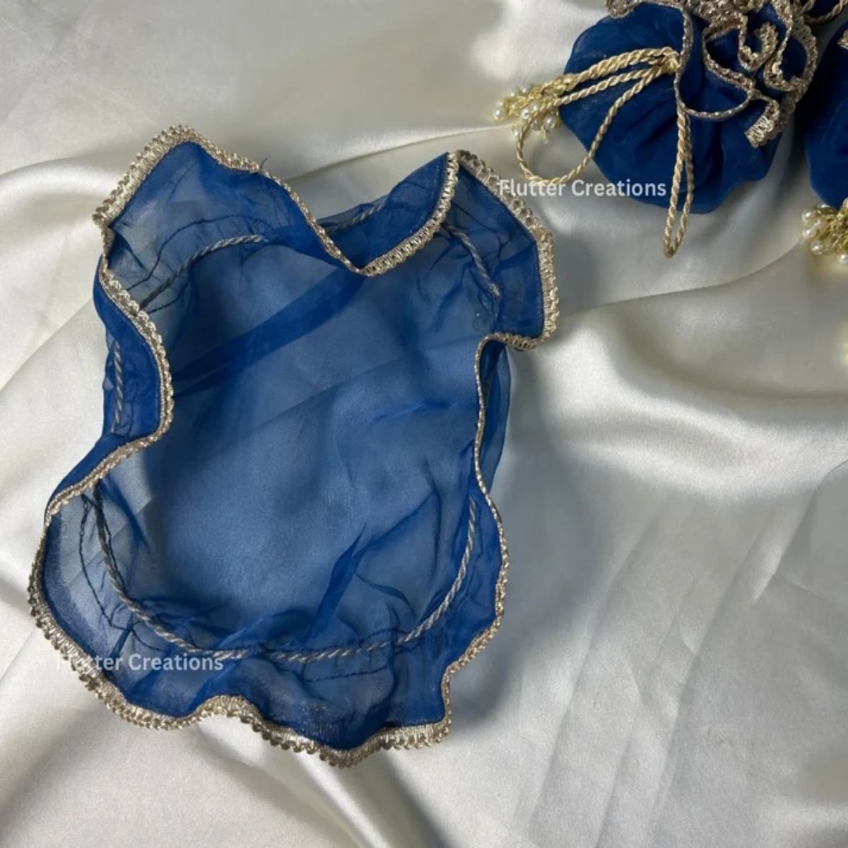 Blue Double Organza Potlis with Double Pearl tassel and tag