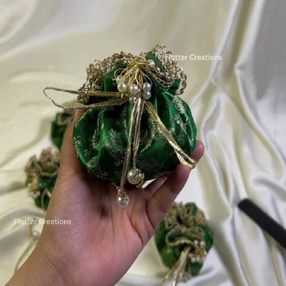Jamawar potlis bags with pearl tassel