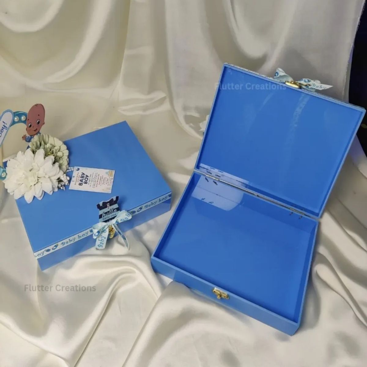Blue Acrylic Its a boy sign with flowers and ribbon
