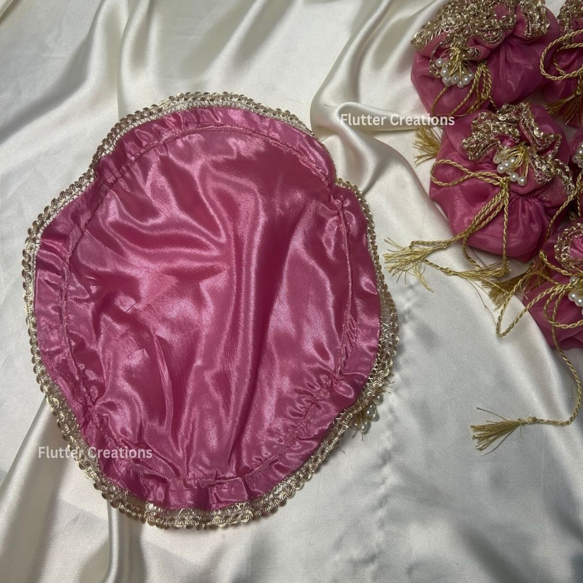 Tea Pink Organza potlis with Pearl tassel and name tag