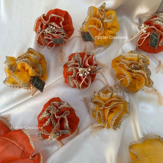 Yellow or Orange Organza Potlis with single pearl tassel and name tag