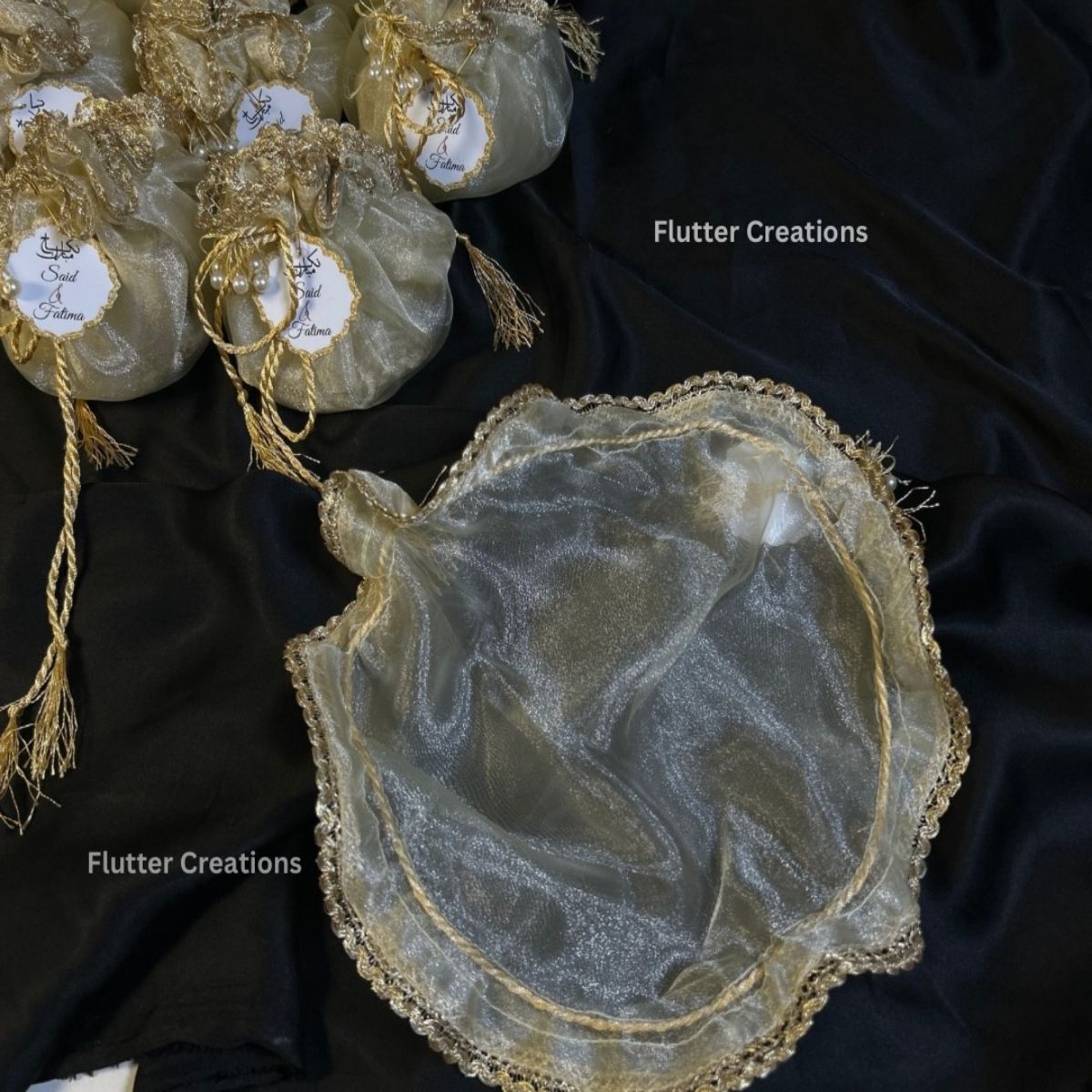 Ivory/Off White Organza potlis with pearl lace and tassel