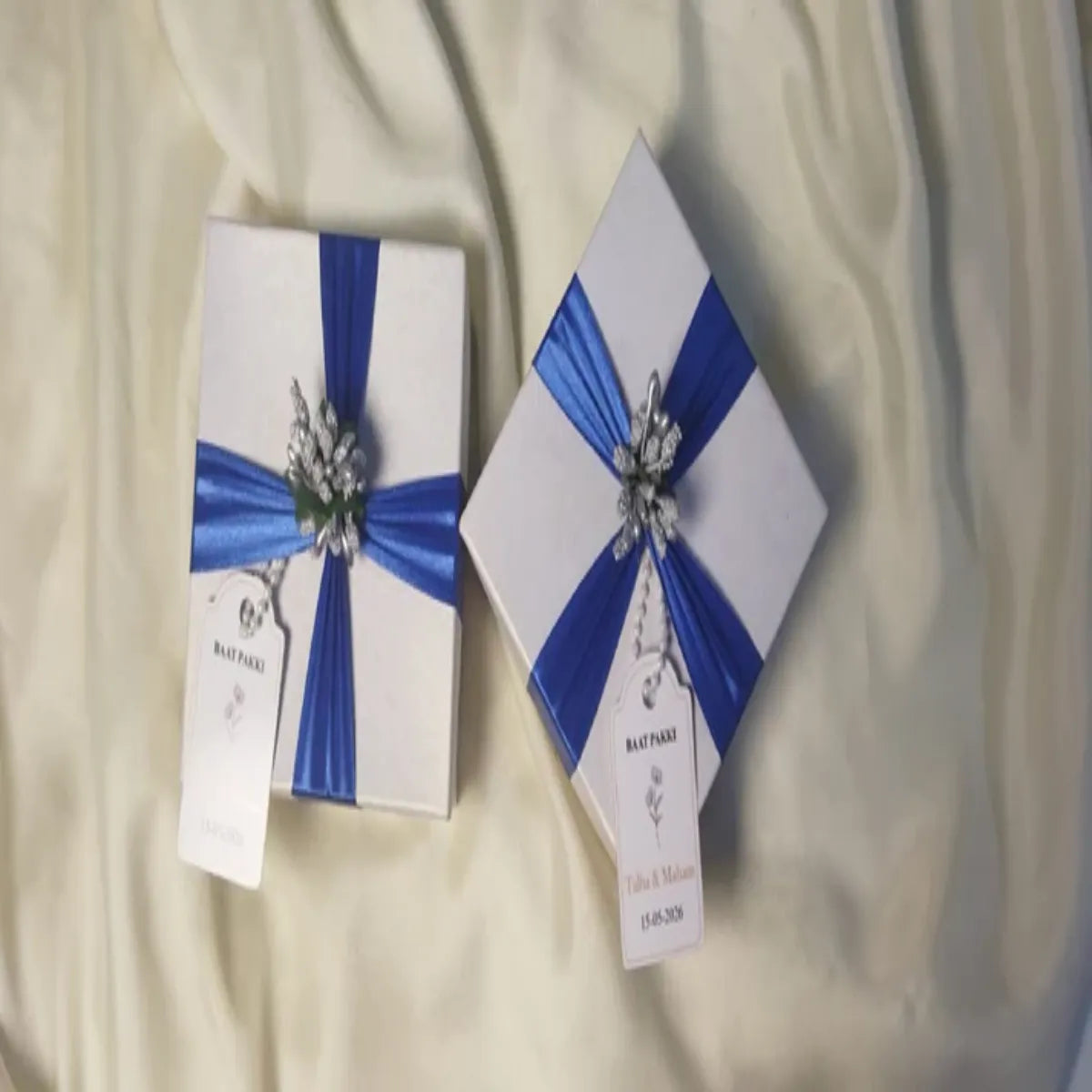 White Box with Blue ribbon and Silver Stamen flowers