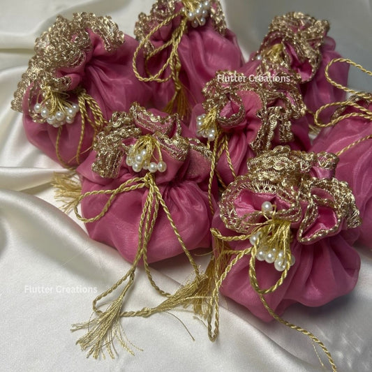 Tea Pink Organza potlis with Pearl tassel and name tag