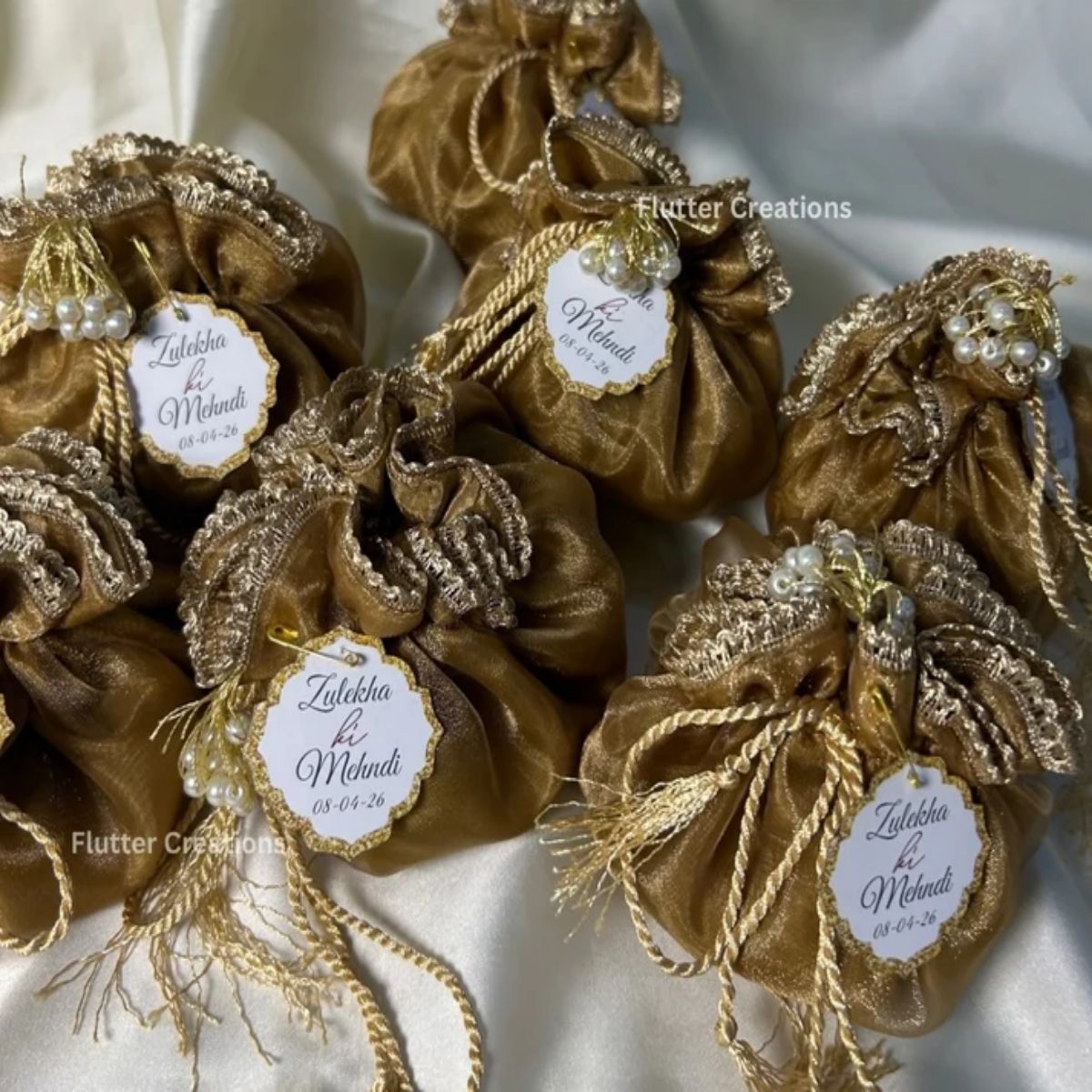 Brown Organza potlis with Silk Lining,pearl tassel and tag