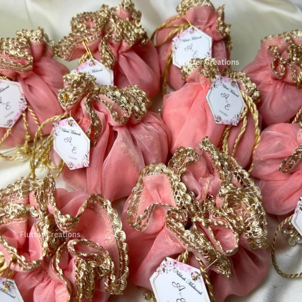 Soft Pink Organza potlis with Pearl tassel and name tag