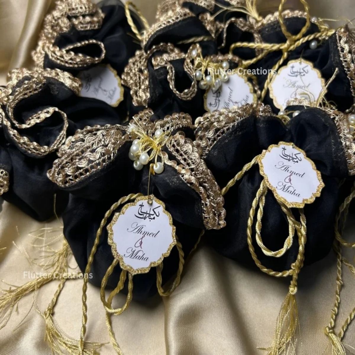Black Organza potlis with Silk Lining,pearl tassel and tag