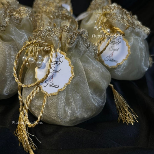 Ivory/Off White Organza potlis with pearl lace and tassel