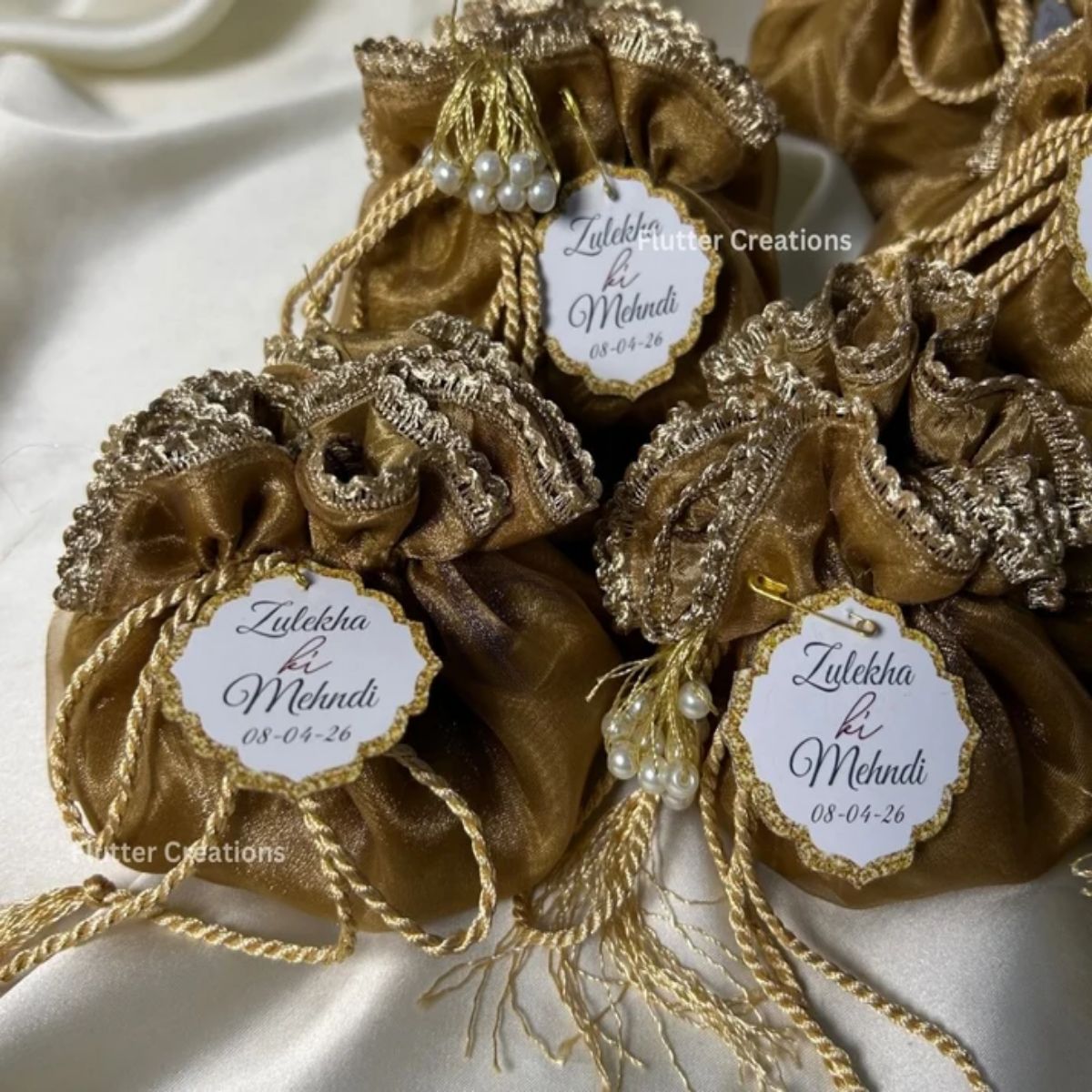 Brown Organza potlis with Silk Lining,pearl tassel and tag