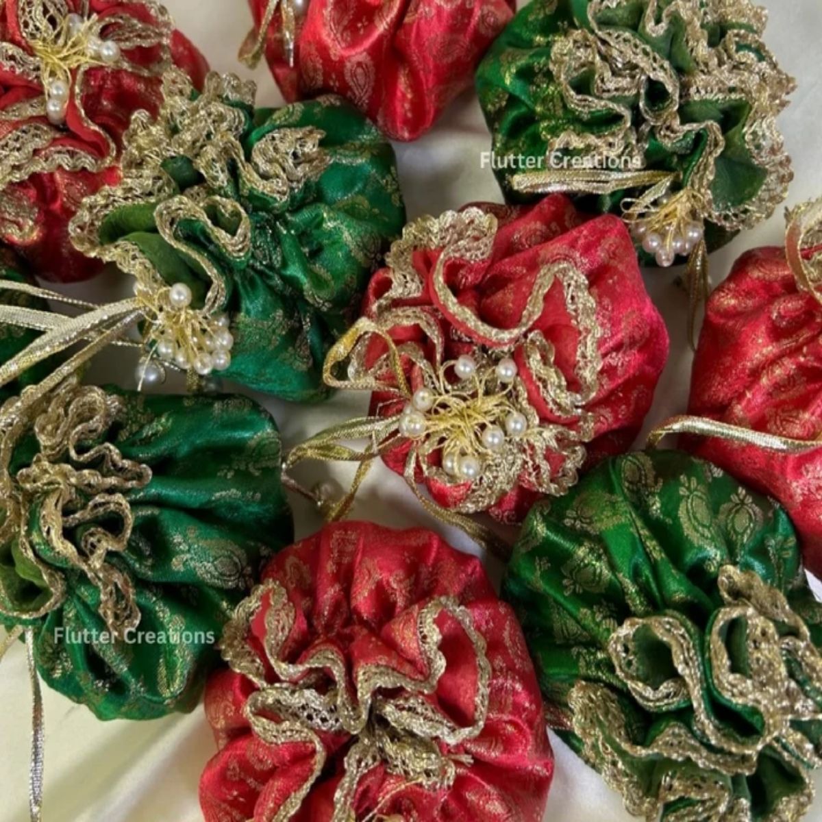 Jamawar potlis bags with pearl tassel