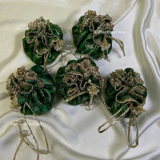 Jamawar potlis bags with pearl tassel